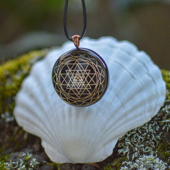 Orgonite® Pendant - Sri Yantra orgone® amulet pendant with quartz crystal. Protection from EMF / RF radiation of cell phone