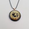 Orgonite® Pendant - Om Aum orgone® amulet pendant with quartz crystal. Protection from EMF / RF radiation of cell phone