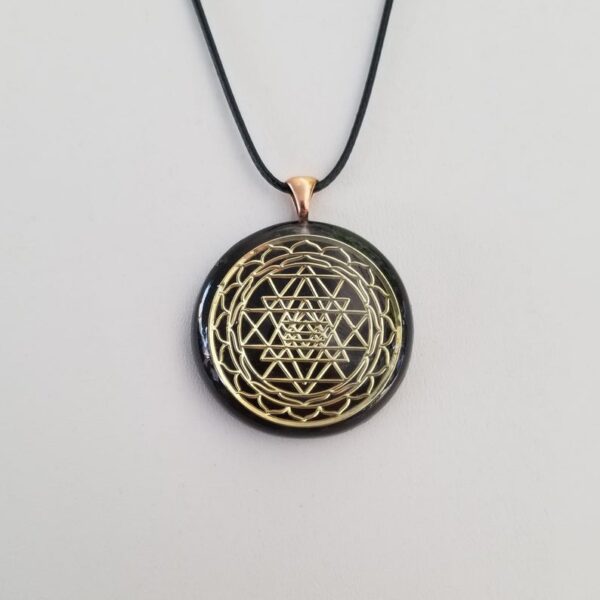 Orgonite® Pendant - Sri Yantra orgone® amulet pendant with quartz crystal. Protection from EMF / RF radiation of cell phone