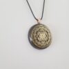 Orgonite® Pendant - Sri Yantra orgone® amulet pendant with quartz crystal. Protection from EMF / RF radiation of cell phone