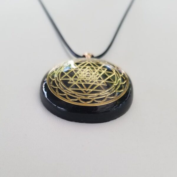 Orgonite® Pendant - Sri Yantra orgone® amulet pendant with quartz crystal. Protection from EMF / RF radiation of cell phone