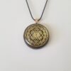 Orgonite® Pendant - Sri Yantra orgone® amulet pendant with quartz crystal. Protection from EMF / RF radiation of cell phone