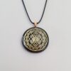 Orgonite® Pendant - Sri Yantra orgone® amulet pendant with quartz crystal. Protection from EMF / RF radiation of cell phone