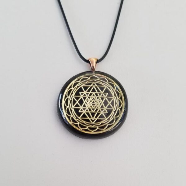 Orgonite® Pendant - Sri Yantra orgone® amulet pendant with quartz crystal. Protection from EMF / RF radiation of cell phone