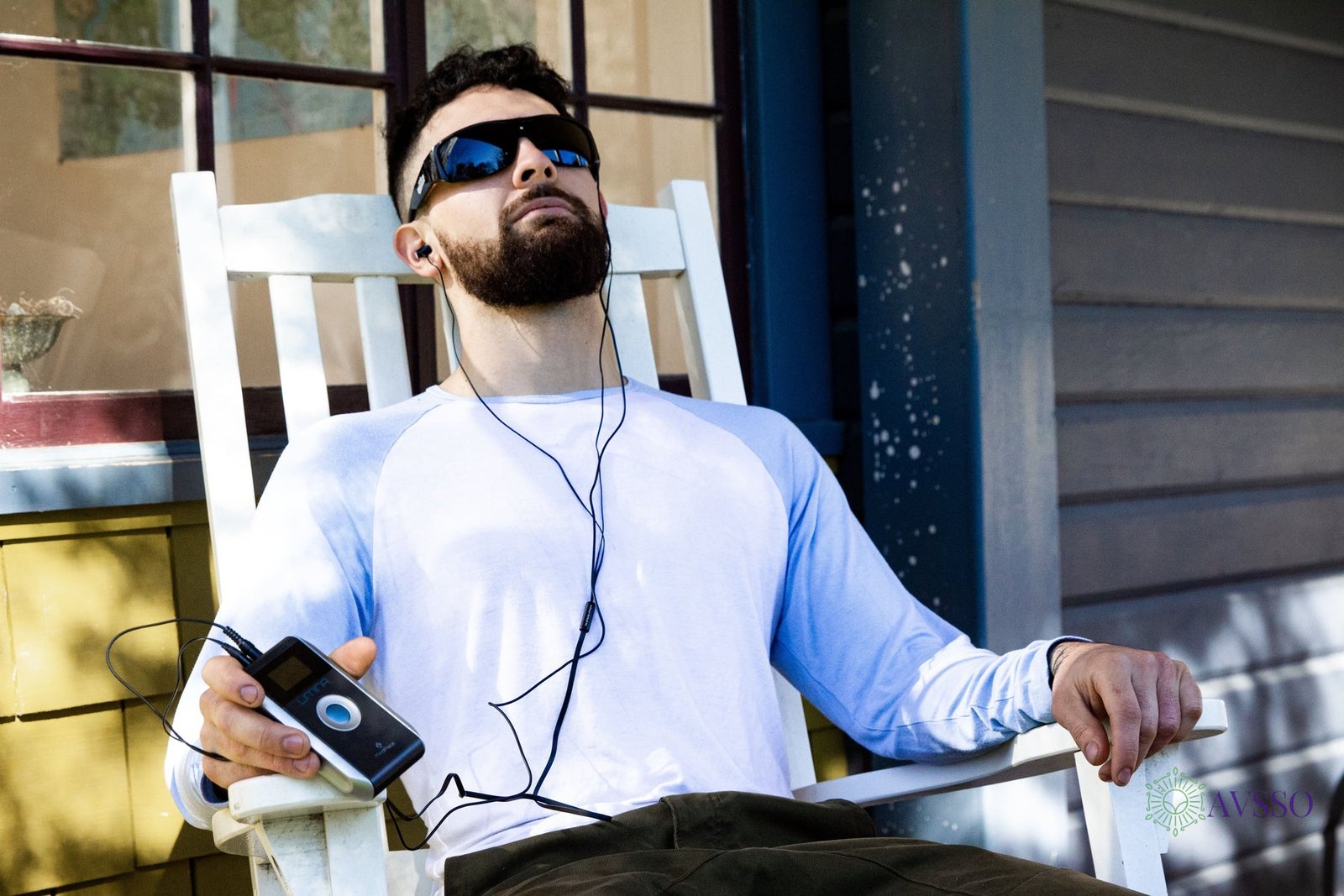 Person wearing MindPlace Limina light and sound glasses during meditation session
